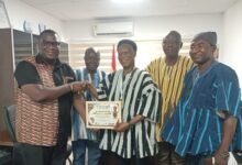 Mr Morgan Ayawine (third from right) receiving the award. With him are some ICU National leadership