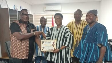 Mr Morgan Ayawine (third from right) receiving the award. With him are some ICU National leadership