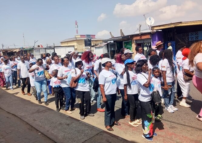 Members of the Amen Amen Institute during the walk