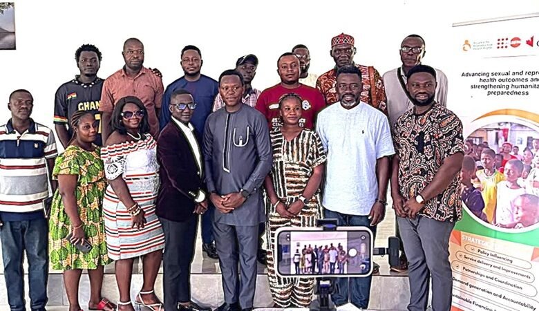 Mr Nyampong (second from right) with journalists and dignitaries after the training