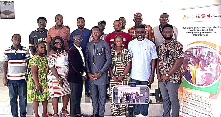 Mr Nyampong (second from right) with journalists and dignitaries after the training