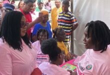 Dr Lartey (left) in a discussion with a participant at the event.
