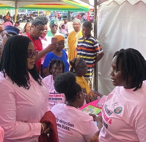 Dr Lartey (left) in a discussion with a participant at the event.