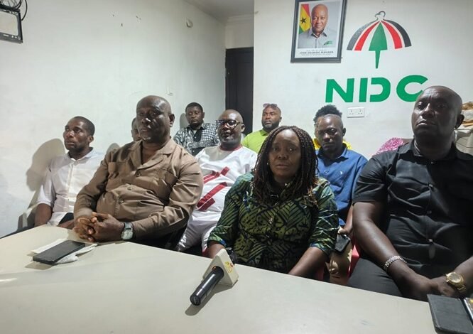 Ms Sowah (middle) speaking briefing the press after the demolition
