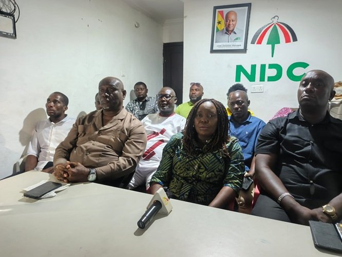 Ms Sowah (middle) speaking briefing the press after the demolition