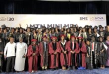 Mr Sadiq (fourth from left) together with other dignitaries and graduates at the event