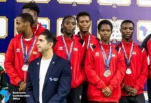 Members of the Golden Shuttlers after receiving their medals