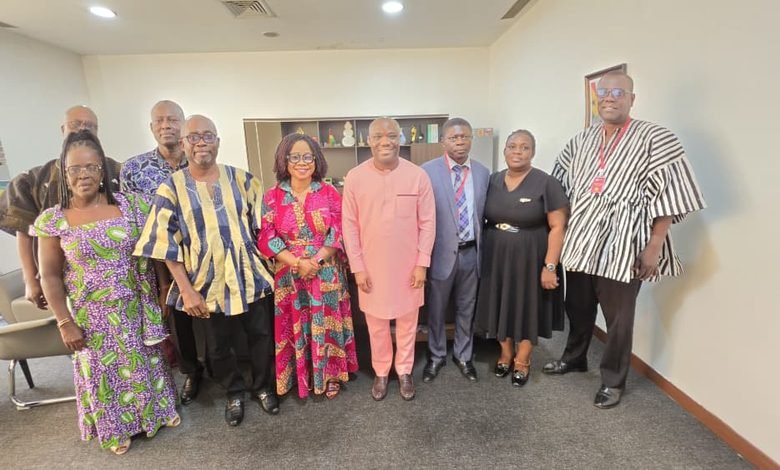 Mr Ofosu Kwakye (middle) with the NTC board members after the meeting
