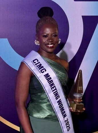 Ms Abena Amoah displaying her plaque.