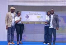 NIB Bancassurance Dr Seidu (left) with Mr Barima (right) displaying the Bancassurance partnership plague