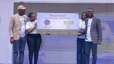 NIB Bancassurance Dr Seidu (left) with Mr Barima (right) displaying the Bancassurance partnership plague