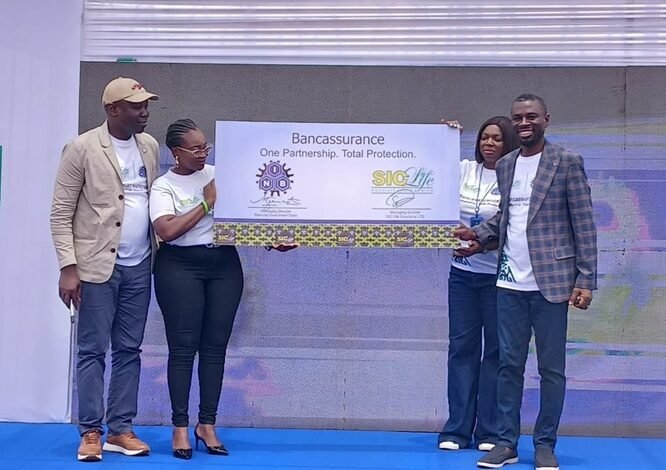 NIB Bancassurance Dr Seidu (left) with Mr Barima (right) displaying the Bancassurance partnership plague