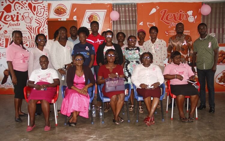 Dr Asare (seated middle) with members of Times Ladies Association after the programme Photo Okai Elizabeth.