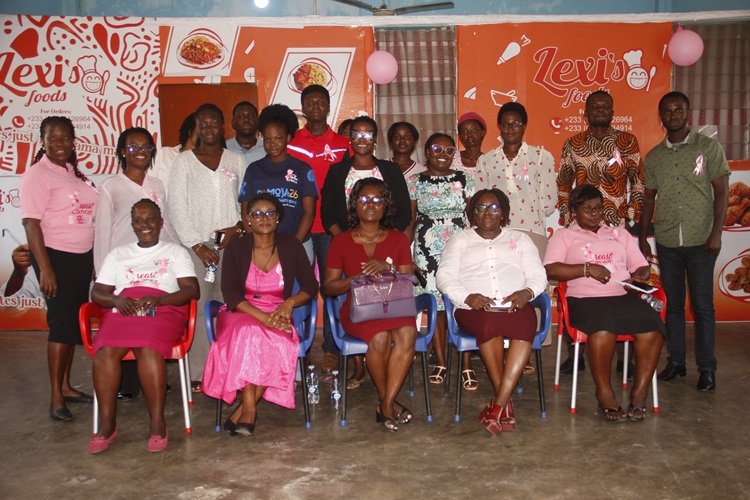 Dr Asare (seated middle) with members of Times Ladies Association after the programme Photo Okai Elizabeth.
