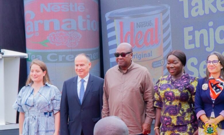 -President Mahama (third from left) with Mrs Elizabeth Ofosu-Adjare (second from right) and officials from Nestlé Ghana Limited after the visit