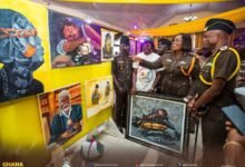 Mrs Baffoe-Bonnie (second from right) and other guests inspecting some of the art exhibits displayed at the programme