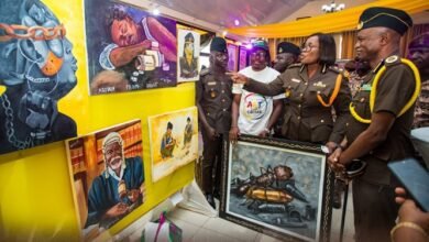 Mrs Baffoe-Bonnie (second from right) and other guests inspecting some of the art exhibits displayed at the programme