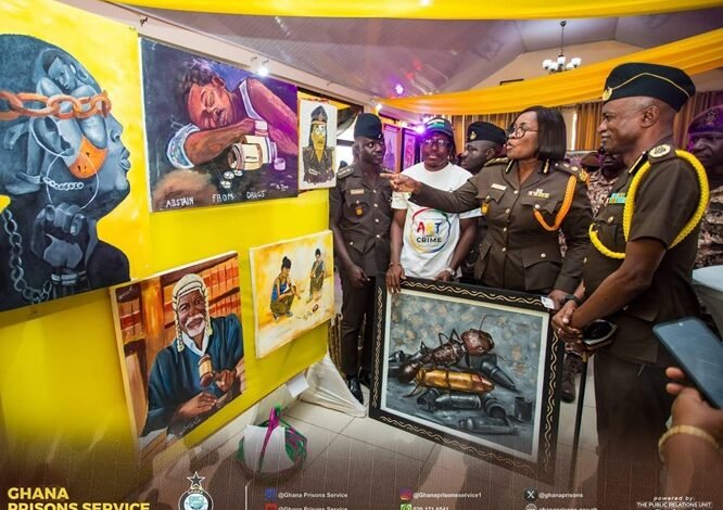 Mrs Baffoe-Bonnie (second from right) and other guests inspecting some of the art exhibits displayed at the programme
