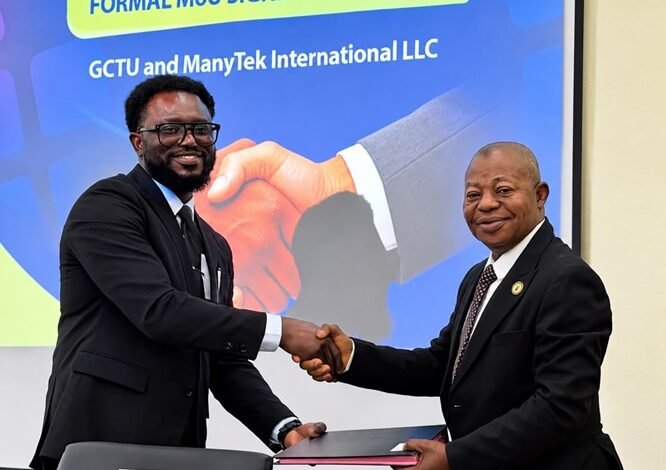 Prof Malcalm (right) with Mr Damptey exchanging the signed document