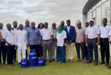 Mr Coulibaly (fifth from left) with Mr Tameklo (fourth from left) and other dignitaries at the programme