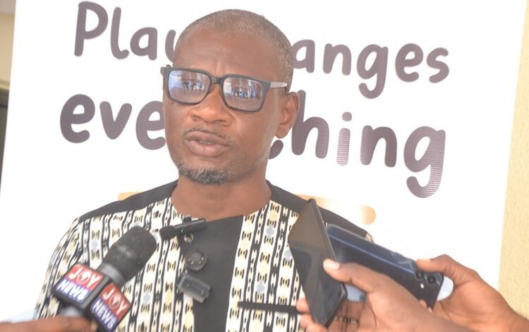 Mr Akubor (inset) speaking at the programme Photo Victor A. Buxton