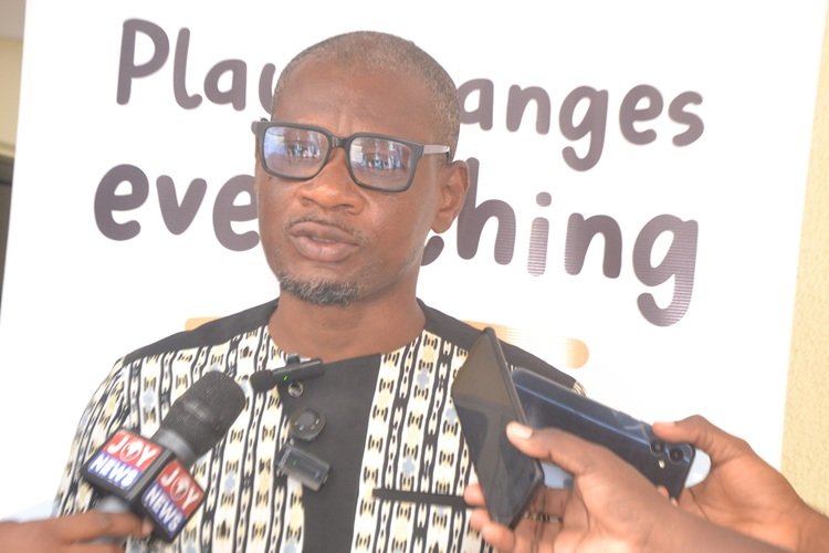 Mr Akubor (inset) speaking at the programme Photo Victor A. Buxton