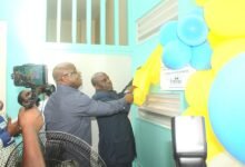Mr Eric Seddy Kutortse and Dr Yakubu Seidu (in front) unveiling a plaque for the renovated surgical ward. Photo Ebo Gorman