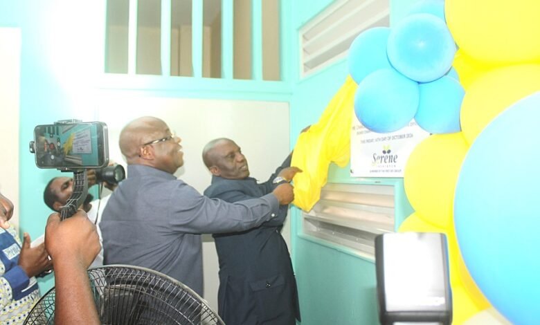Mr Eric Seddy Kutortse and Dr Yakubu Seidu (in front) unveiling a plaque for the renovated surgical ward. Photo Ebo Gorman