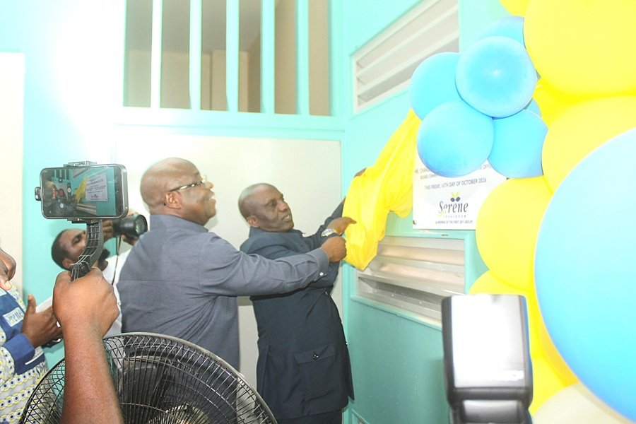 Mr Eric Seddy Kutortse and Dr Yakubu Seidu (in front) unveiling a plaque for the renovated surgical ward. Photo Ebo Gorman