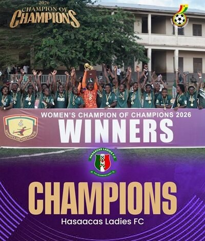 Skipper Grace Banwaa Buoadu lifts the trophy to celebrate with her teammates 
