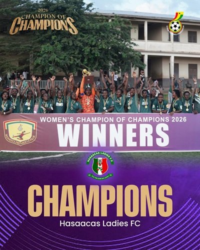 Skipper Grace Banwaa Buoadu lifts the trophy to celebrate with her teammates 