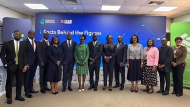 Mr Godzi (second from left) with Ms Amoah (third from left) and some senior officials of Standard Chartered Bank.