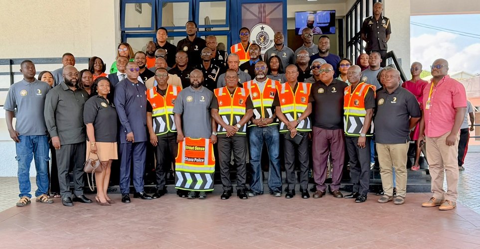 Mr Yohonu (front row middle) with Mr Oddoye (front row sixth from right) and other memers of the police and Street Sence Organisation