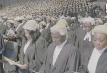 The newly qualified lawyers taking the oath at the ceremony