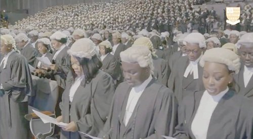 The newly qualified lawyers taking the oath at the ceremony