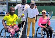 The wheelchair players and an official of the GTF