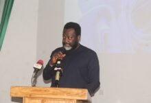 Mr Awotiirim (inset) addressing participants at the programme. Photo. Ebo Gorman