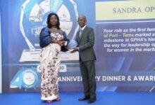Mr. Asiedu Nketiah (right) presenting an award to one of the award winners at the event