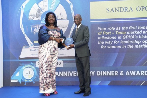 Mr. Asiedu Nketiah (right) presenting an award to one of the award winners at the event