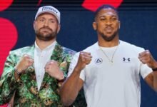 Tyson Fury (left) and Anthony Joshua at a press conference in London