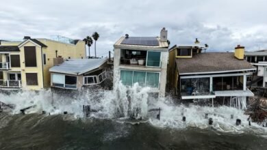 Waves from post-tropical cyclone Rachel crash into beachfront homes in Long Beach, Calif on Monday