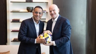 Ahmed Yahya (left) with Gianni Infantino