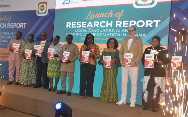 • Ms Muslim (second from right) being assisted by Mr Sam (thrid from left),Dr Binka (fourth from right),Mr Kvistad (third from right) and other dignitaries at the launch Photo: Victor A. Buxton