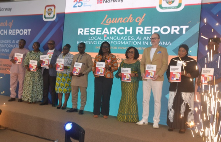 • Ms Muslim (second from right) being assisted by Mr Sam (thrid from left),Dr Binka (fourth from right),Mr Kvistad (third from right) and other dignitaries at the launch Photo: Victor A. Buxton