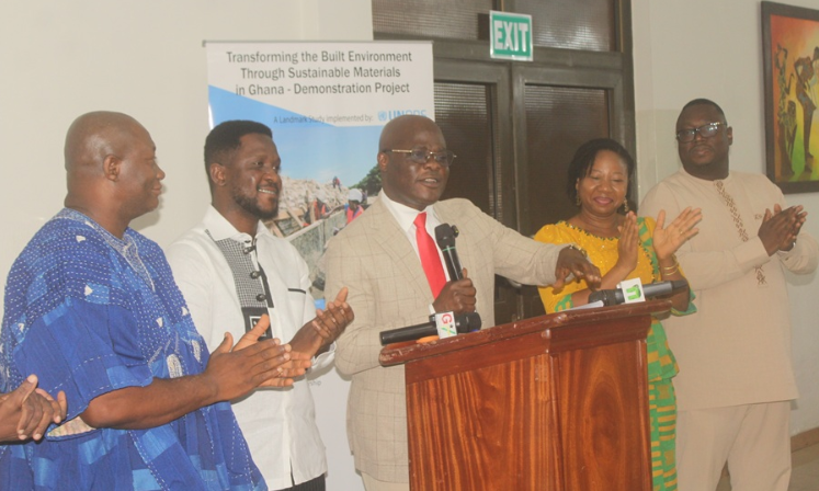 • Mr Ahmed Ibrahim (third from right) launching the Ghana's Built Environment Through Sustainable Materials project, with dignitaries applauding at the launch Photo: Ebo Gorman