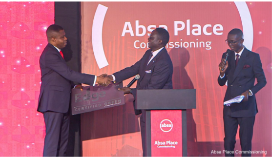 Dr. Botchway (left) receiving the certification at the ceremony