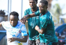 Chelsea 's Jonah Attuquaye breaks away from Samertex duo of Edem Asamoah and James Sewornu