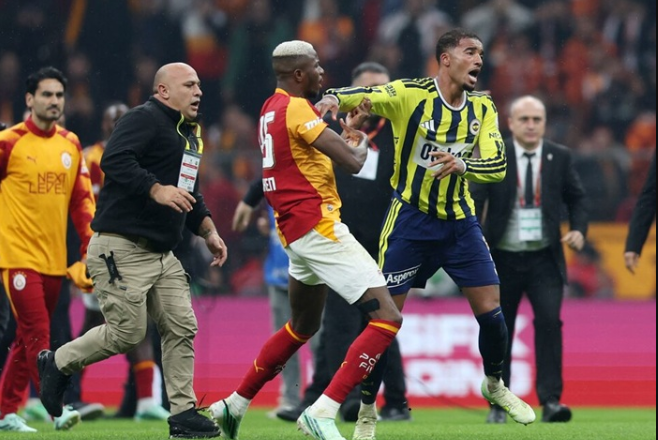 Victor Osimhen clashes with Fenerbahce's Archie Brown after the match