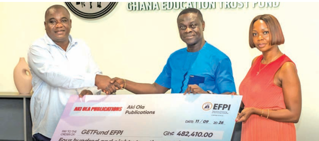 • Mr Peter Asiedu (middle) presenting a dummy cheque to Mr Dandaawa