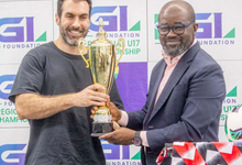 • Mr Salamouni presenting one of the trophies to Mr Simeon-Okraku at the launch
